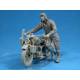 U.S. SOLDIER PUSHING MOTORCYCLE