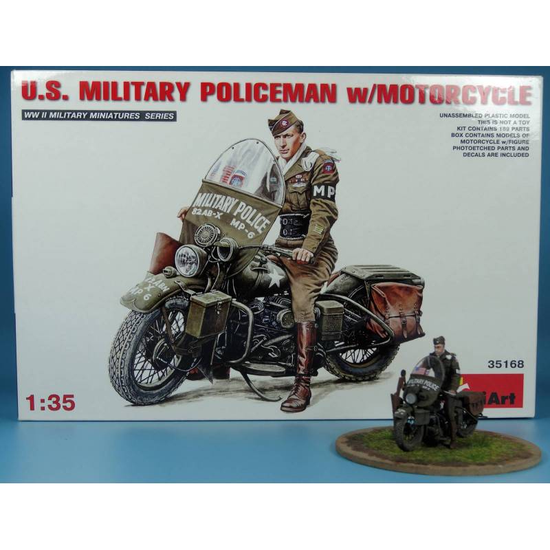 La moto miniature en métal de Police avec motard incomplète au 1
