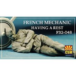 French mechanic naving a rest